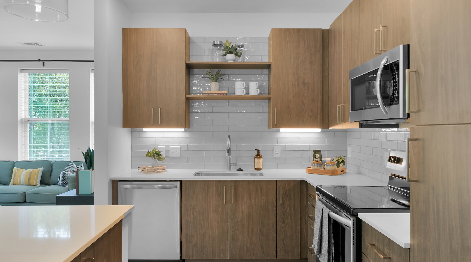 a kitchen with a white tile backsplash