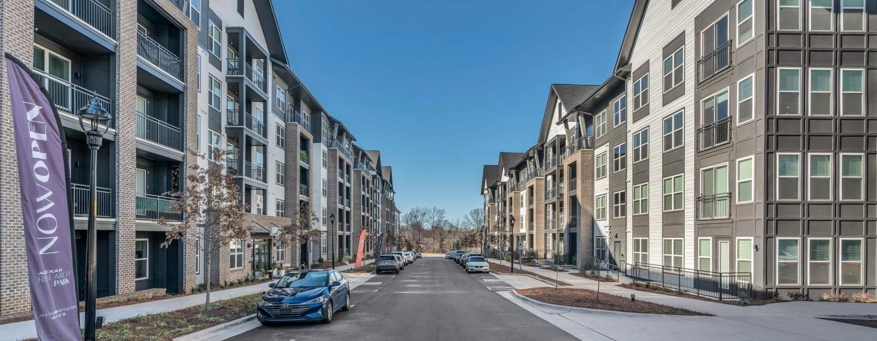 street with flanked by apartment buildings